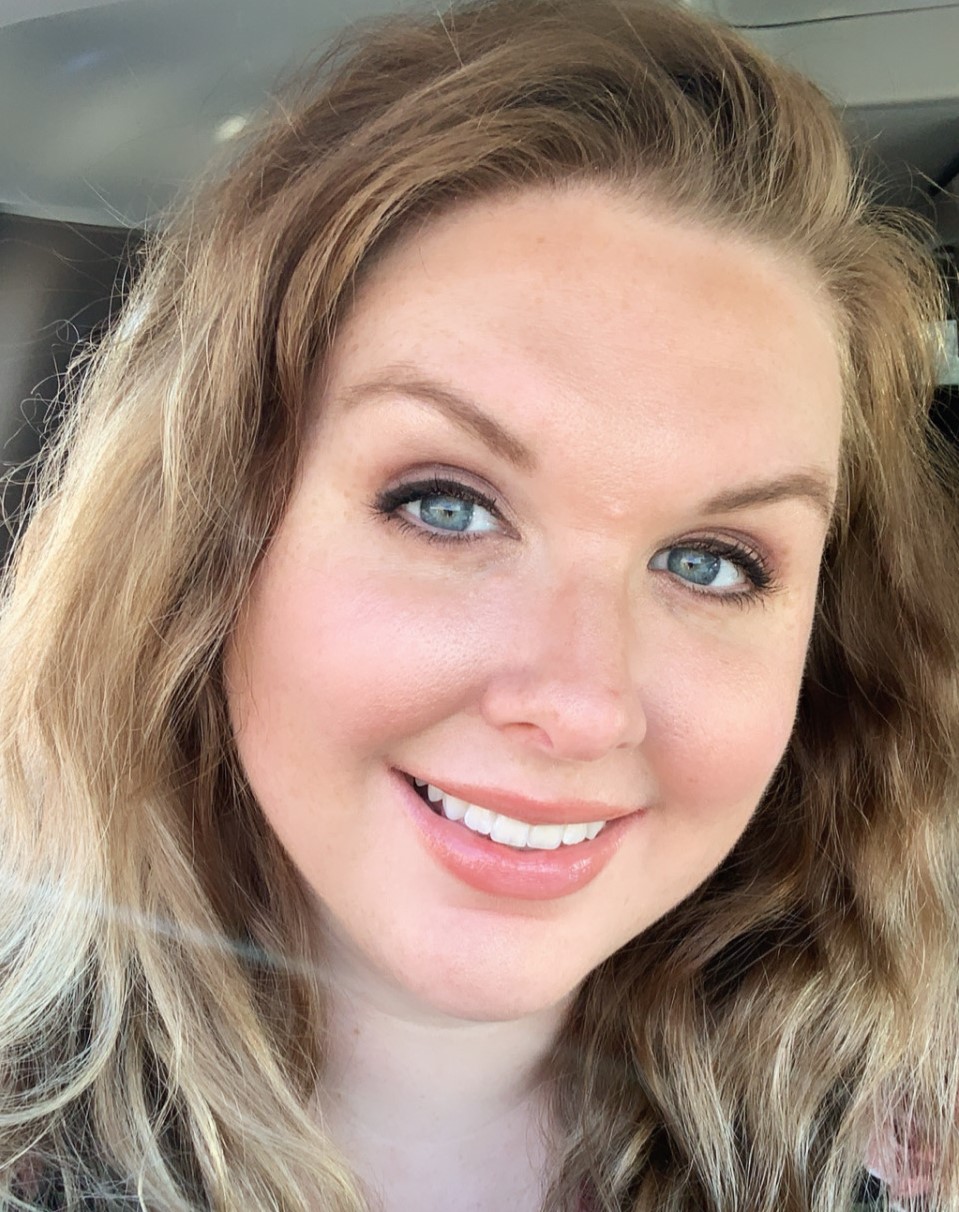 Picture of owner with bronde hair and blue eyes smiling.